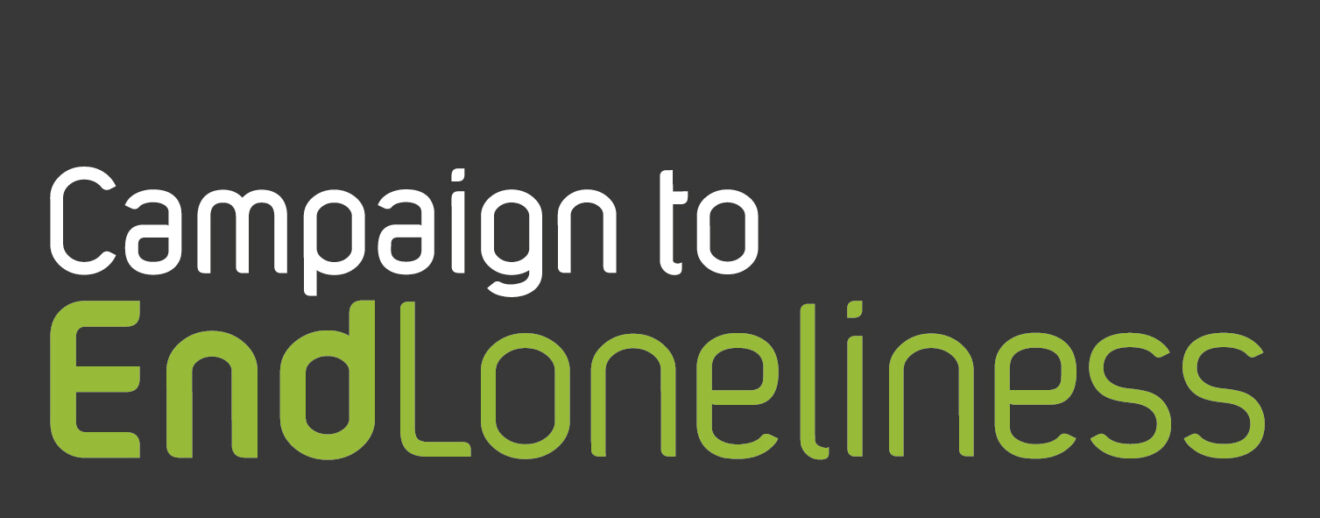 Our logo. Campaign to End Loneliness written in white and green text on a black background.